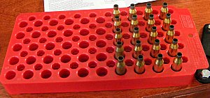 20 primed cases waiting for powder and bullets